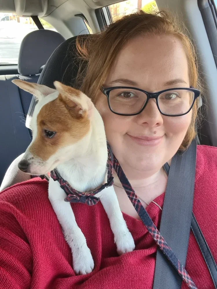 Ida with a pet on her shoulder