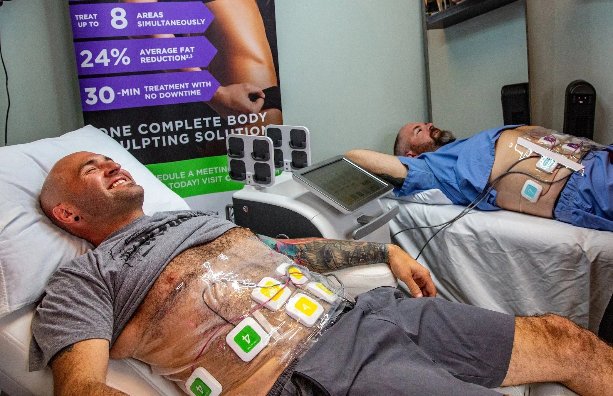 Image of men receiving body sculpting.