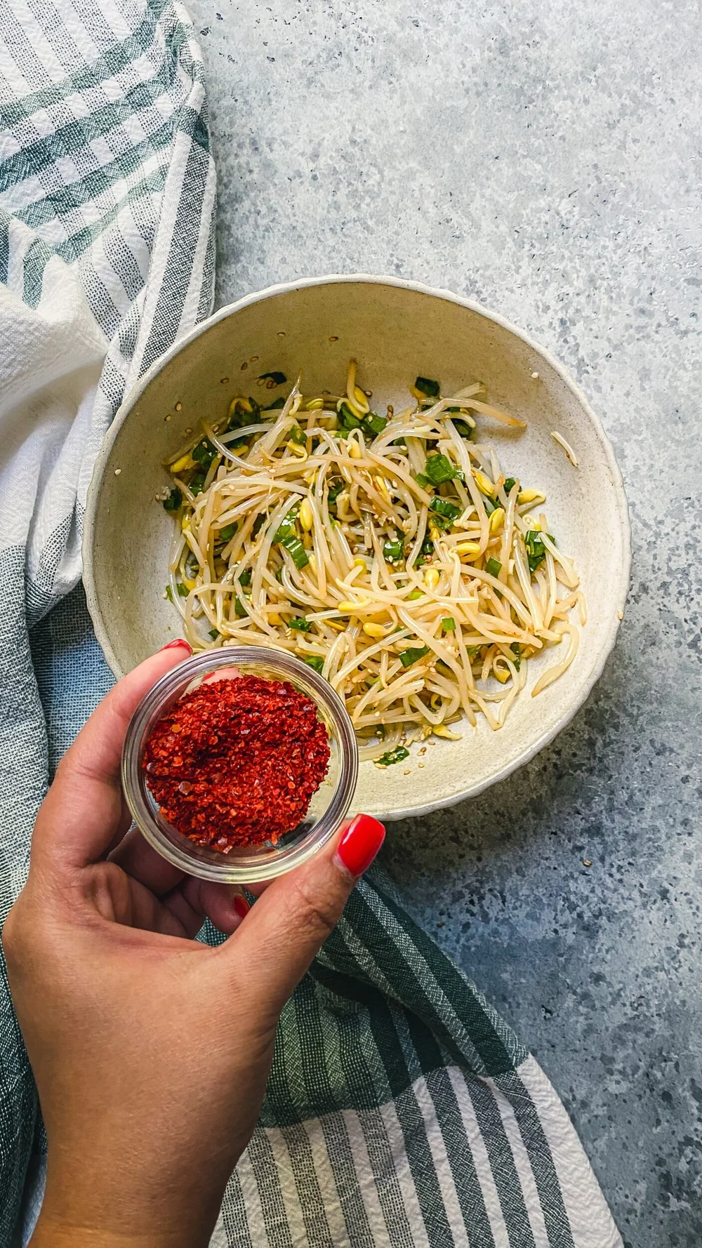 Add 2-3 tsp of gochugaru and mix again!