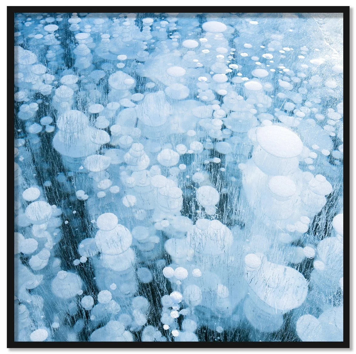 Cryo II framed fine art print by Luca Marziale, stacked white methane bubbles frozen in turquoise ice with dark vertical streaks, Abraham Lake, Alberta, Canada