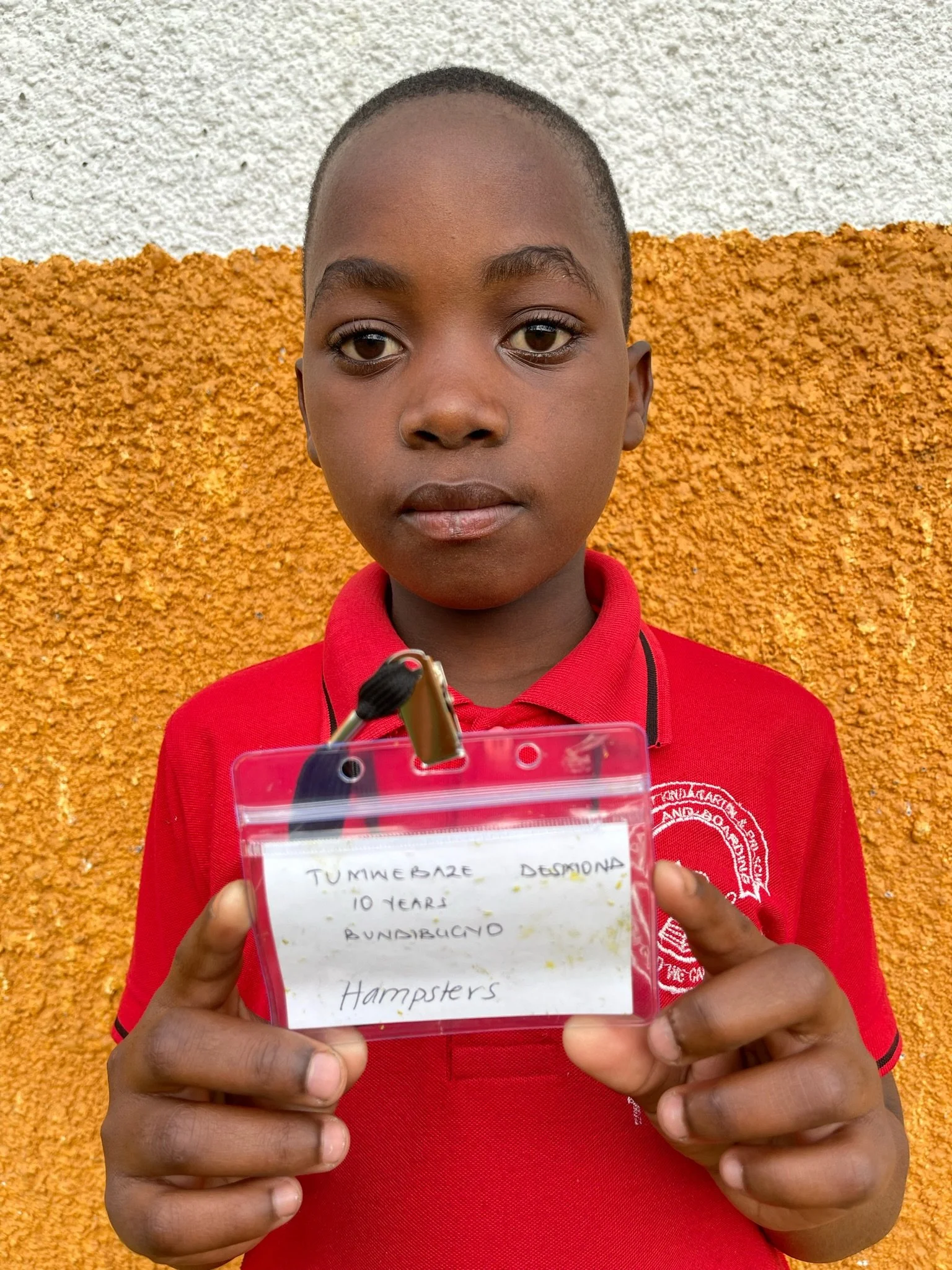 Tumwebaze Desmond, age 10
