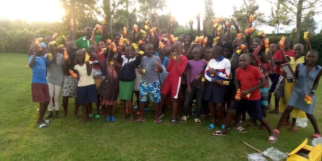 Some of our kids at Ibonde Children’s Home with their sodas and candy on Easter!