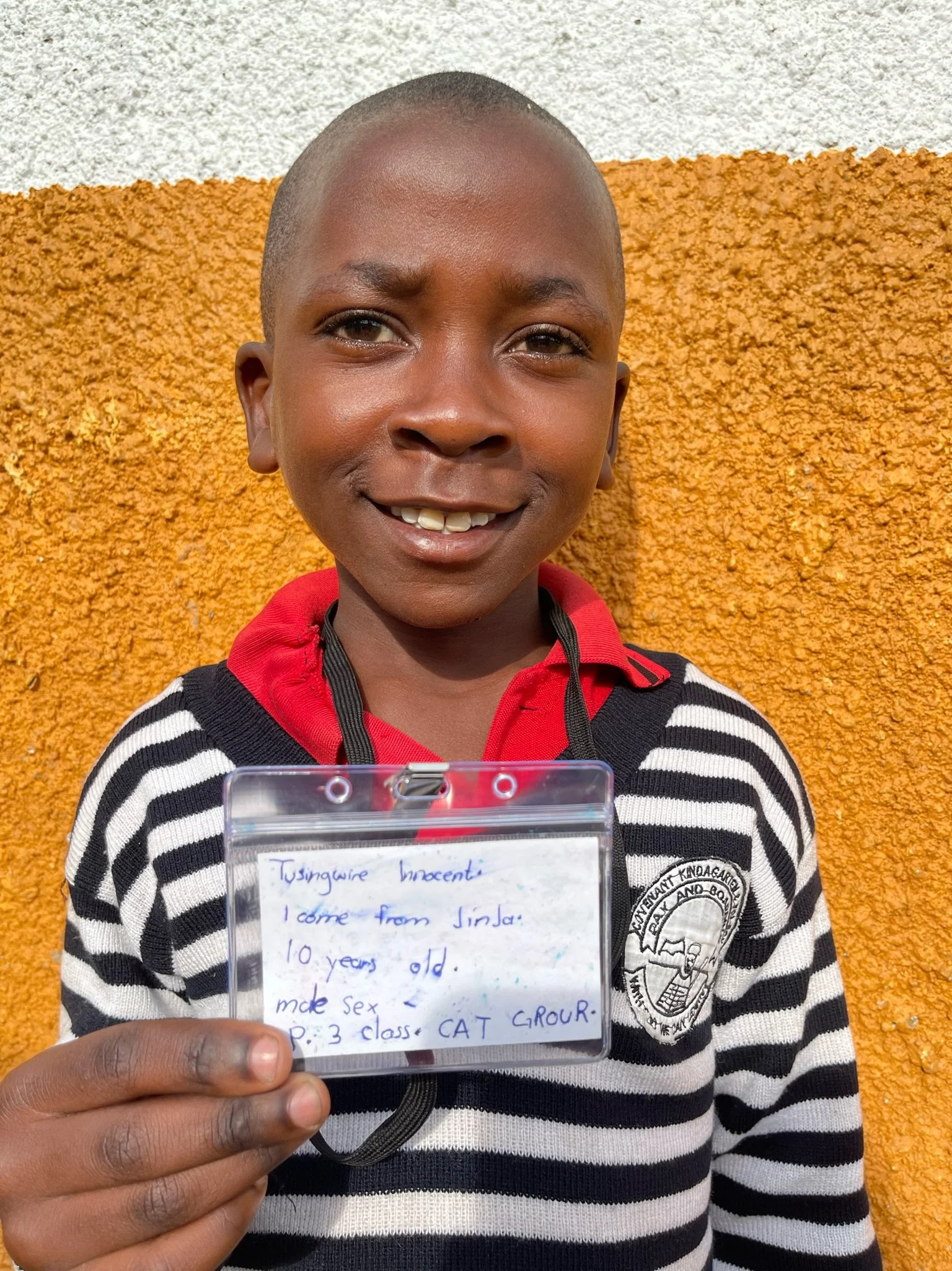 Tusingwire Innocent, age 10