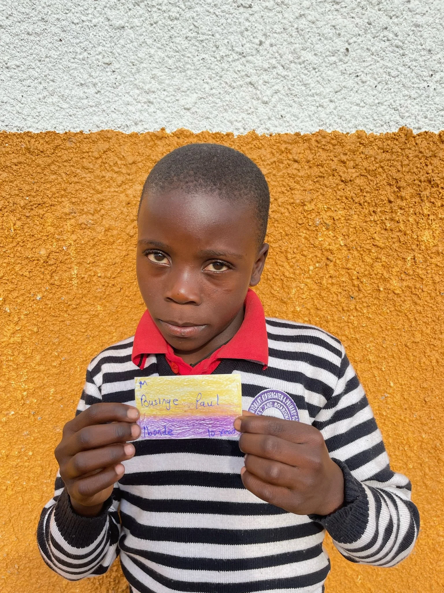 Businge Paul, age 10