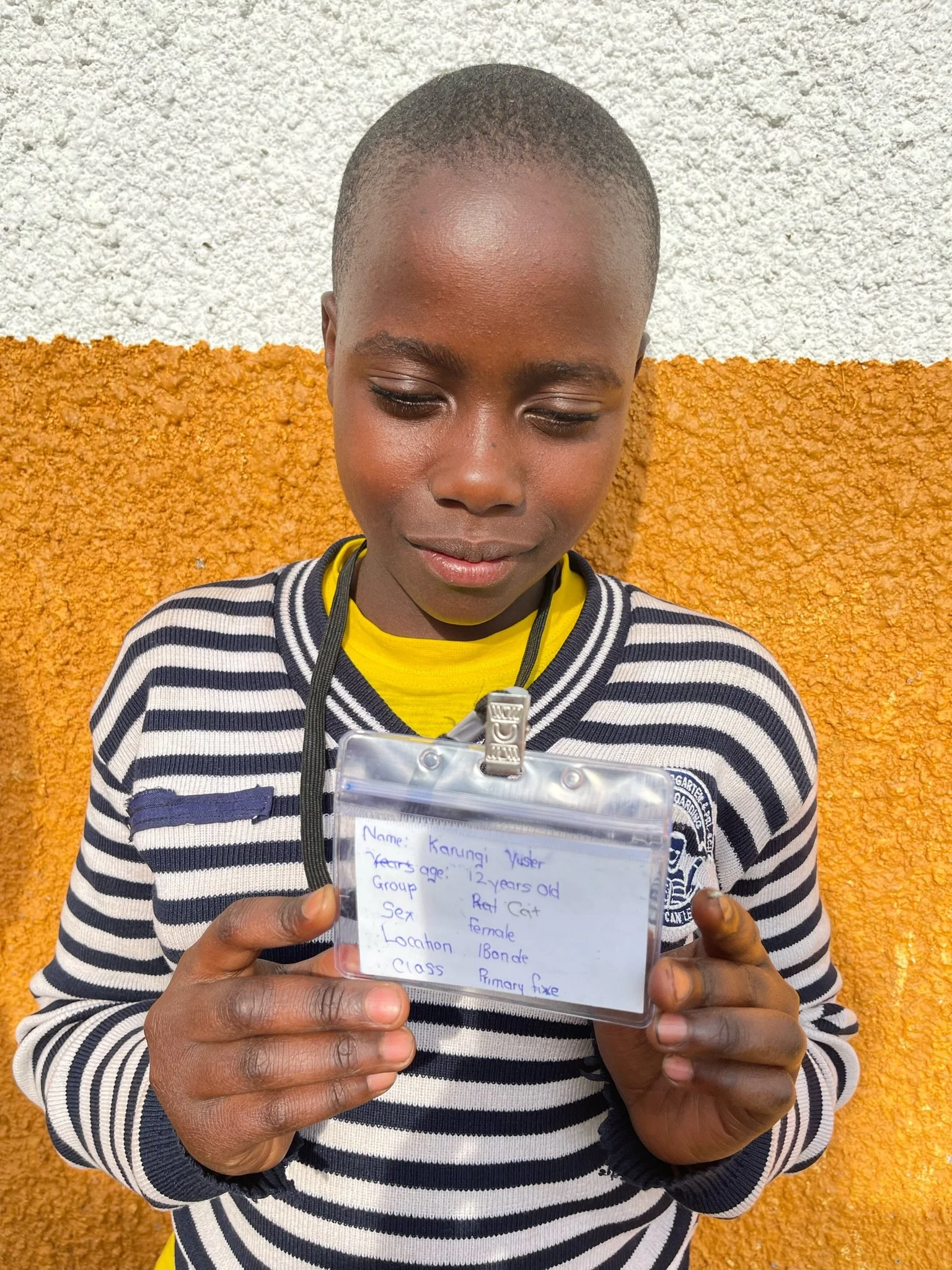 Karungi Yusher, age 12