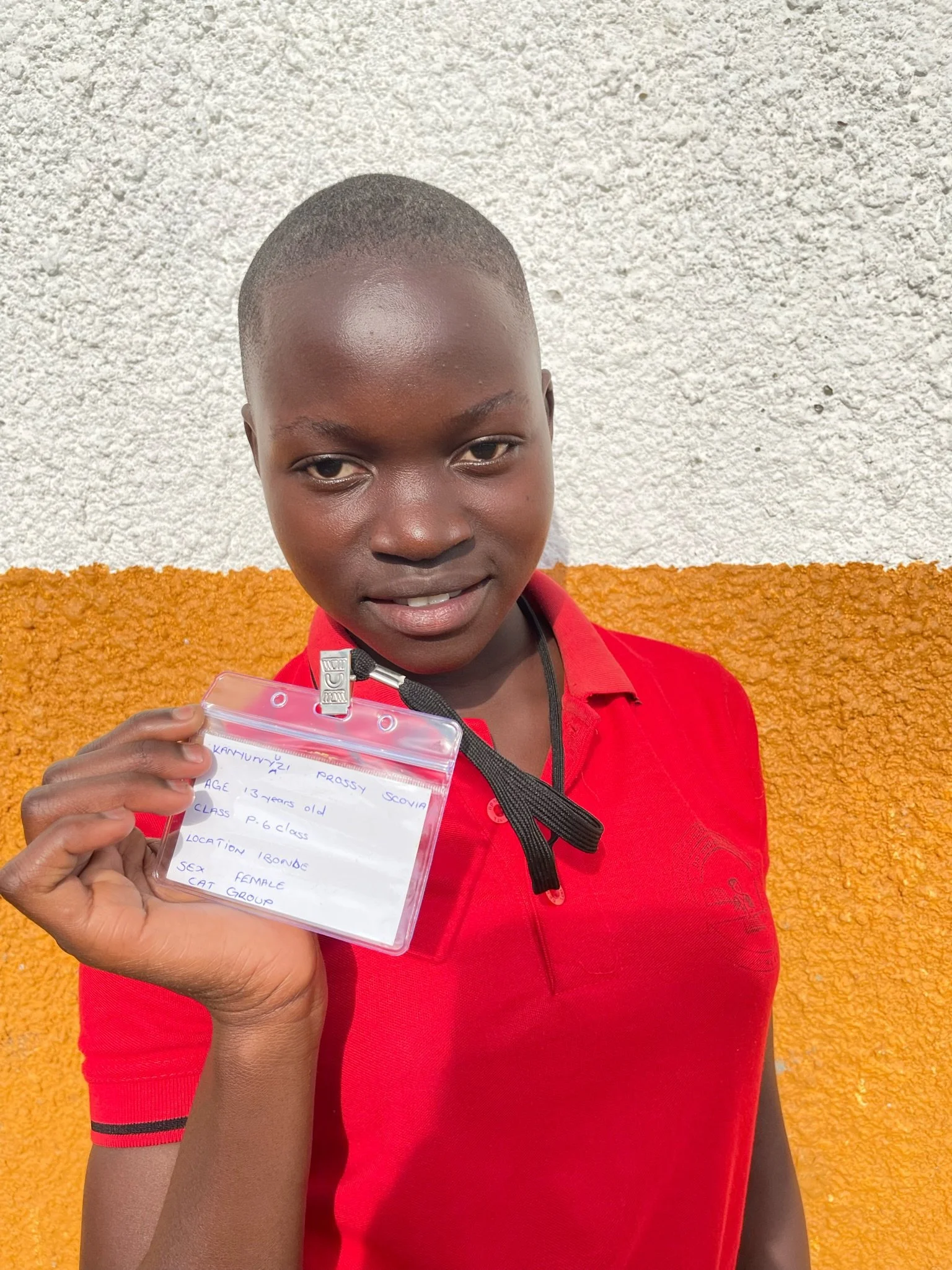 Kanyunyuzi Prossy Scovia, age 13