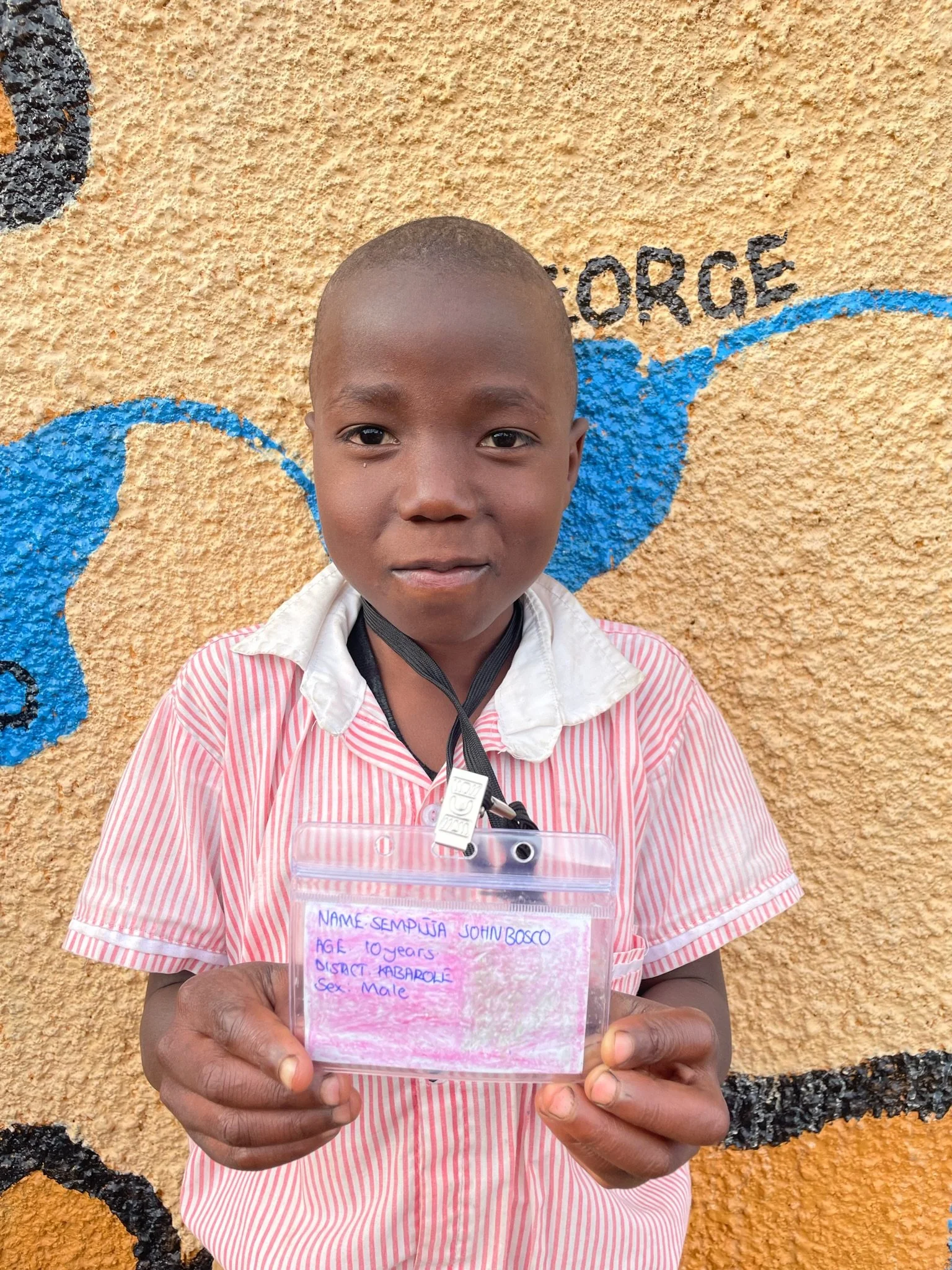 Sempijja John Bosco, age 10