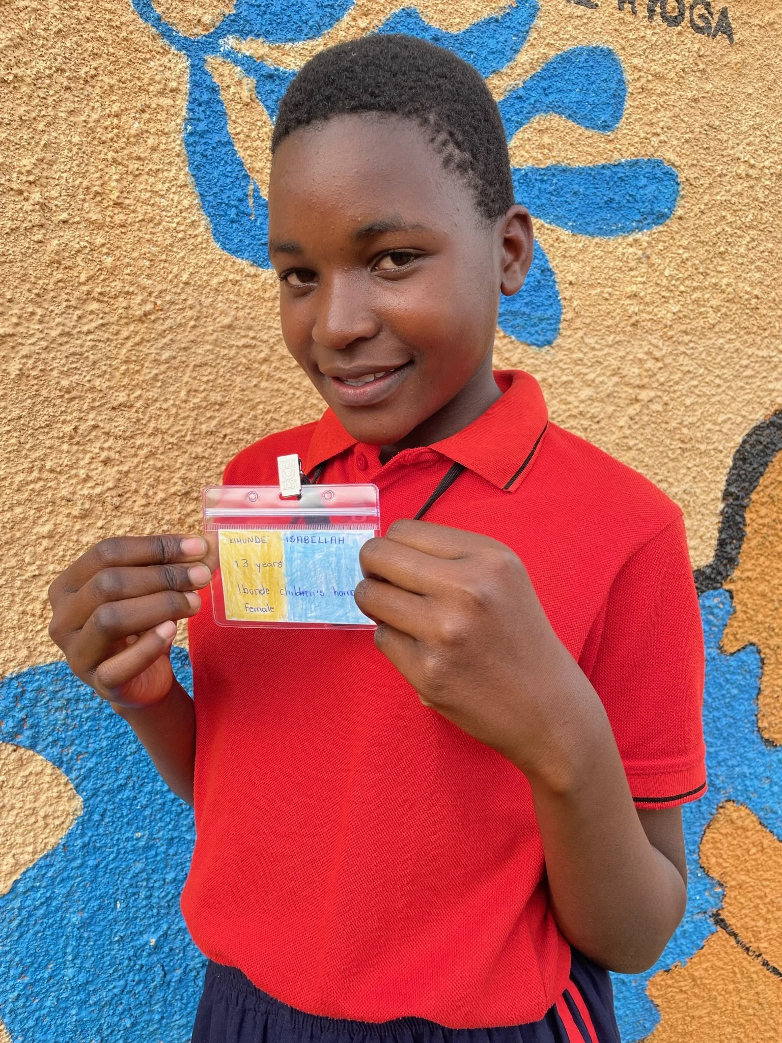 Kihunde Isabellah, age 13