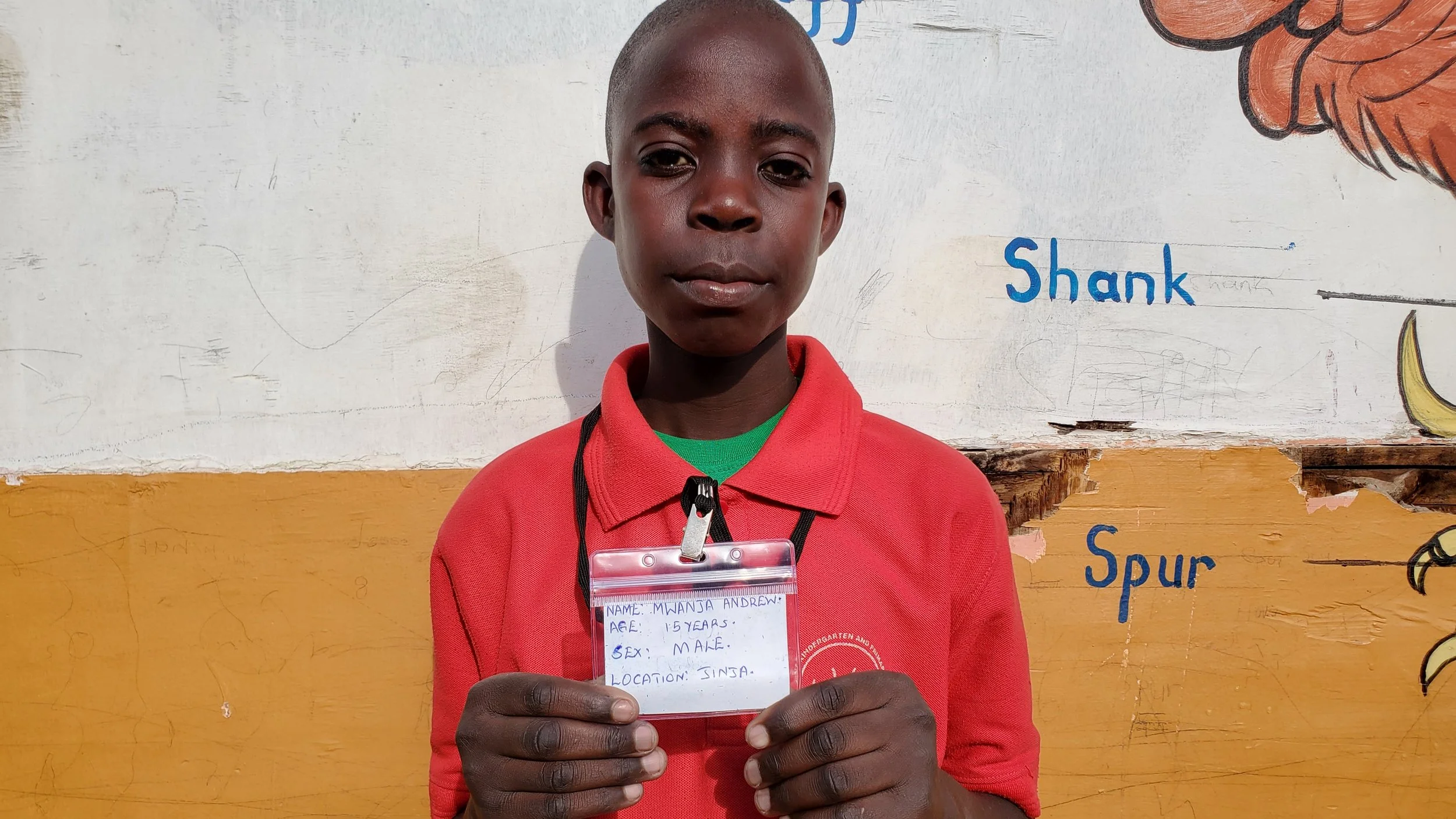 Mwanja Andrew, age 15