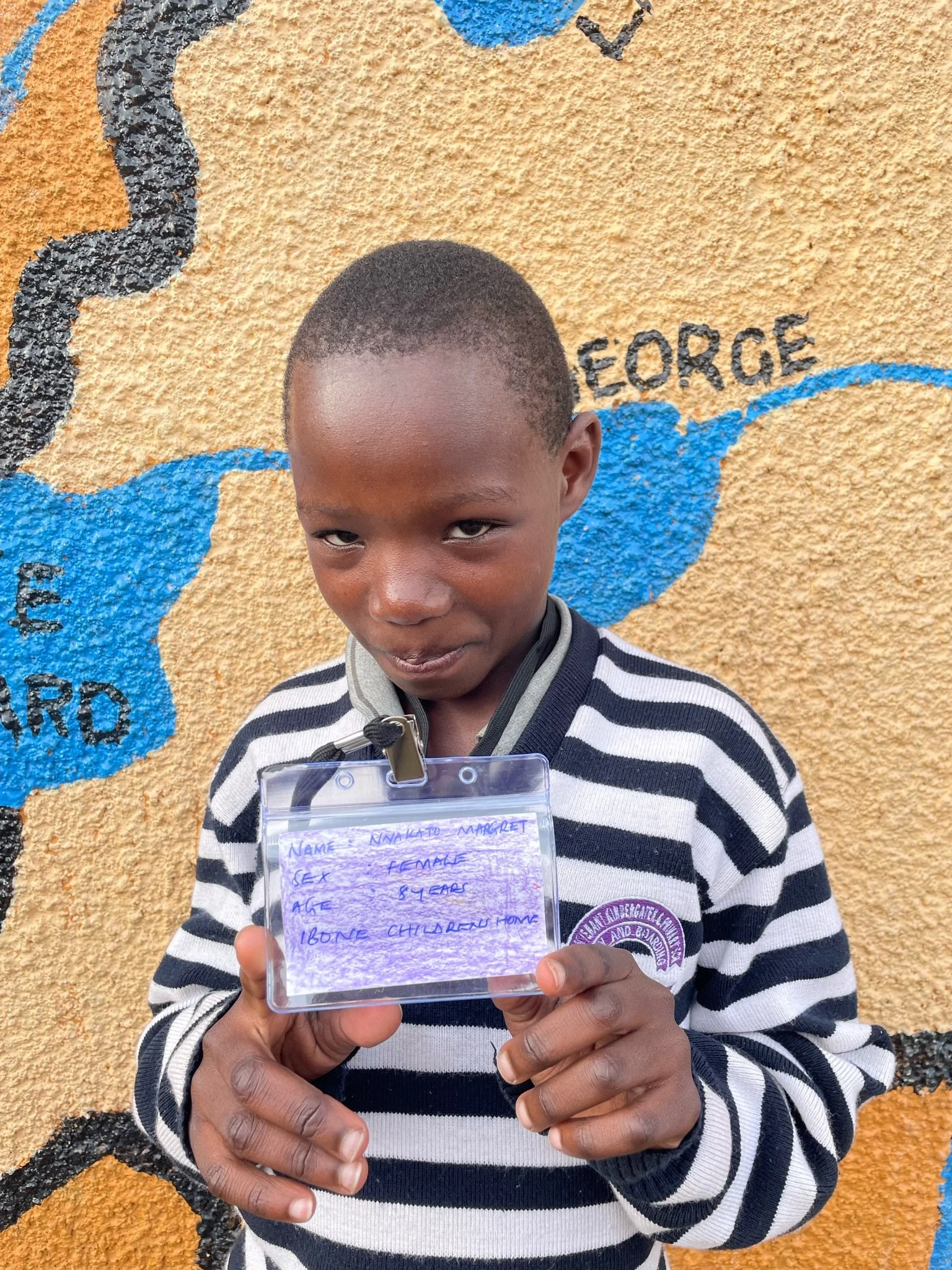 Nyakato Margret, age 8