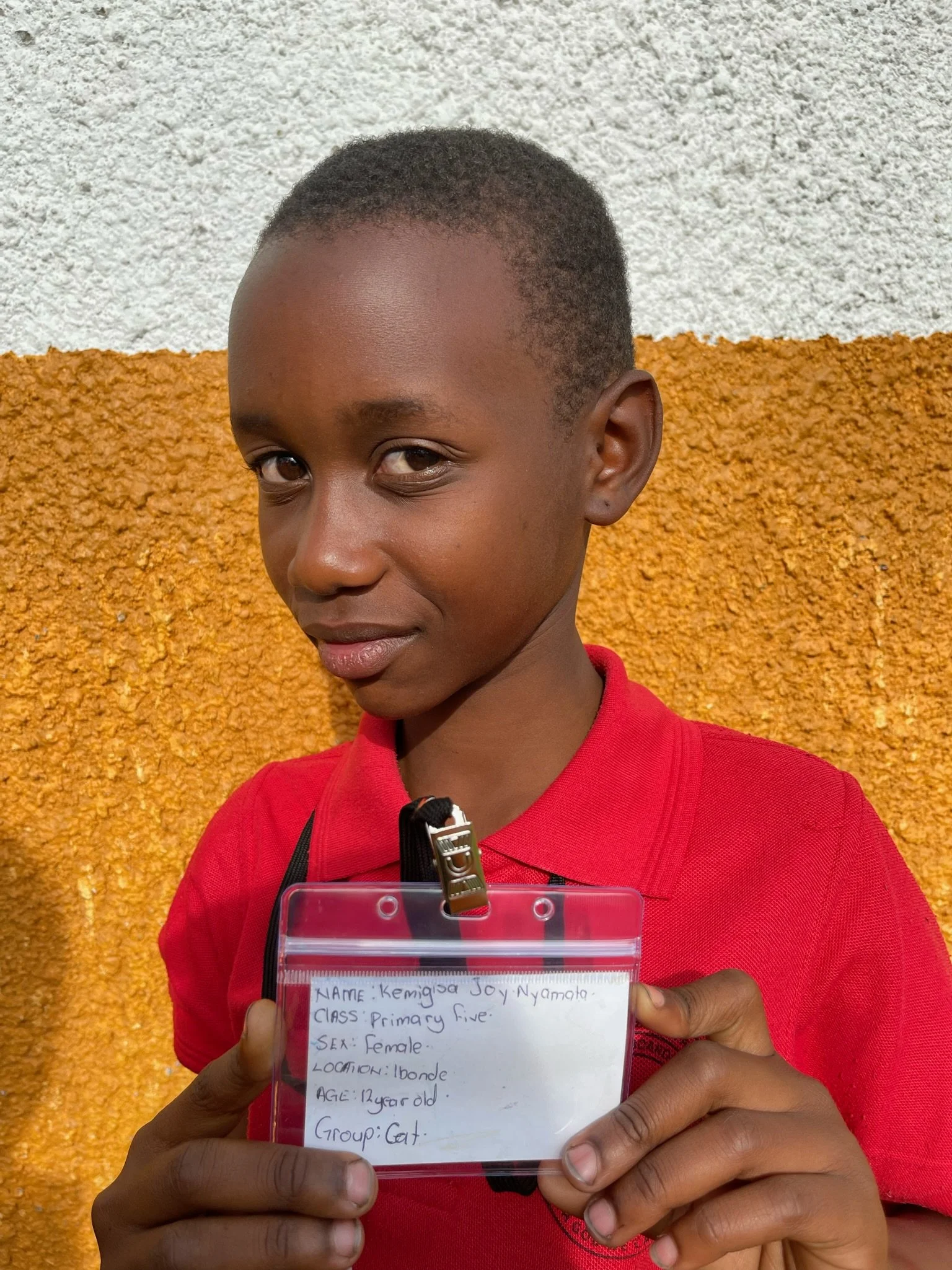 Kemigisa Joy Nyamata, age 12