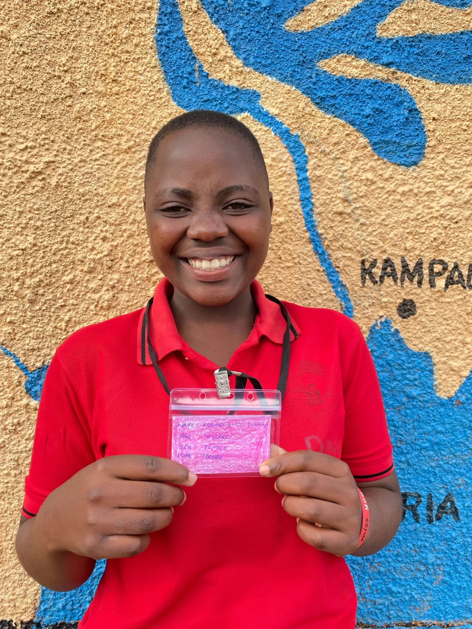 Karungi Lucy Dianah, age 14