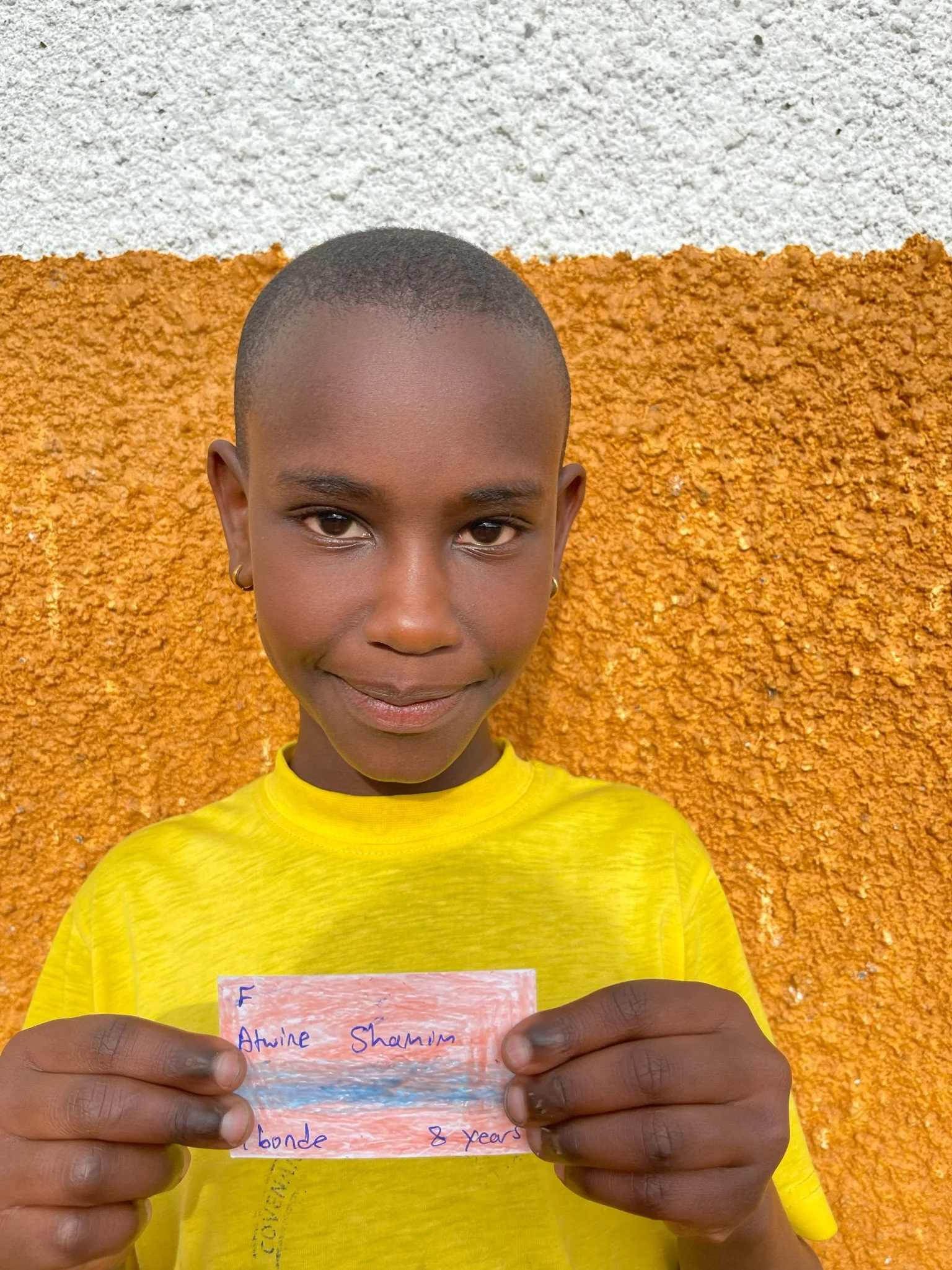 Atwine Shamim, age 8