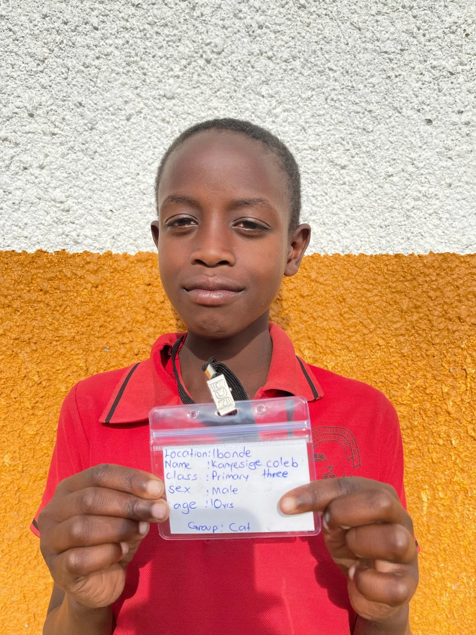 Kanyesige Coleb, age 10