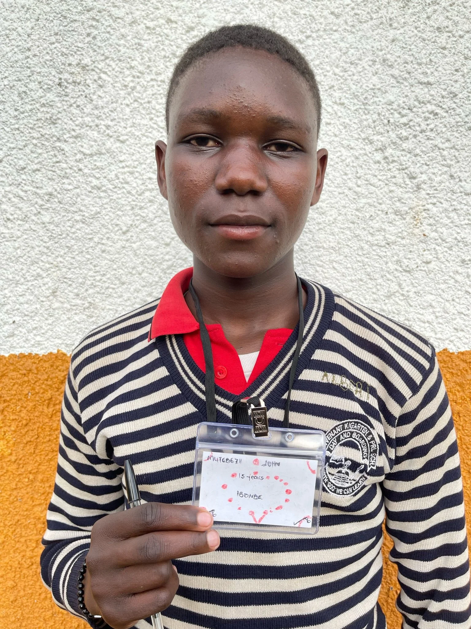 Mutebezii John, age 15