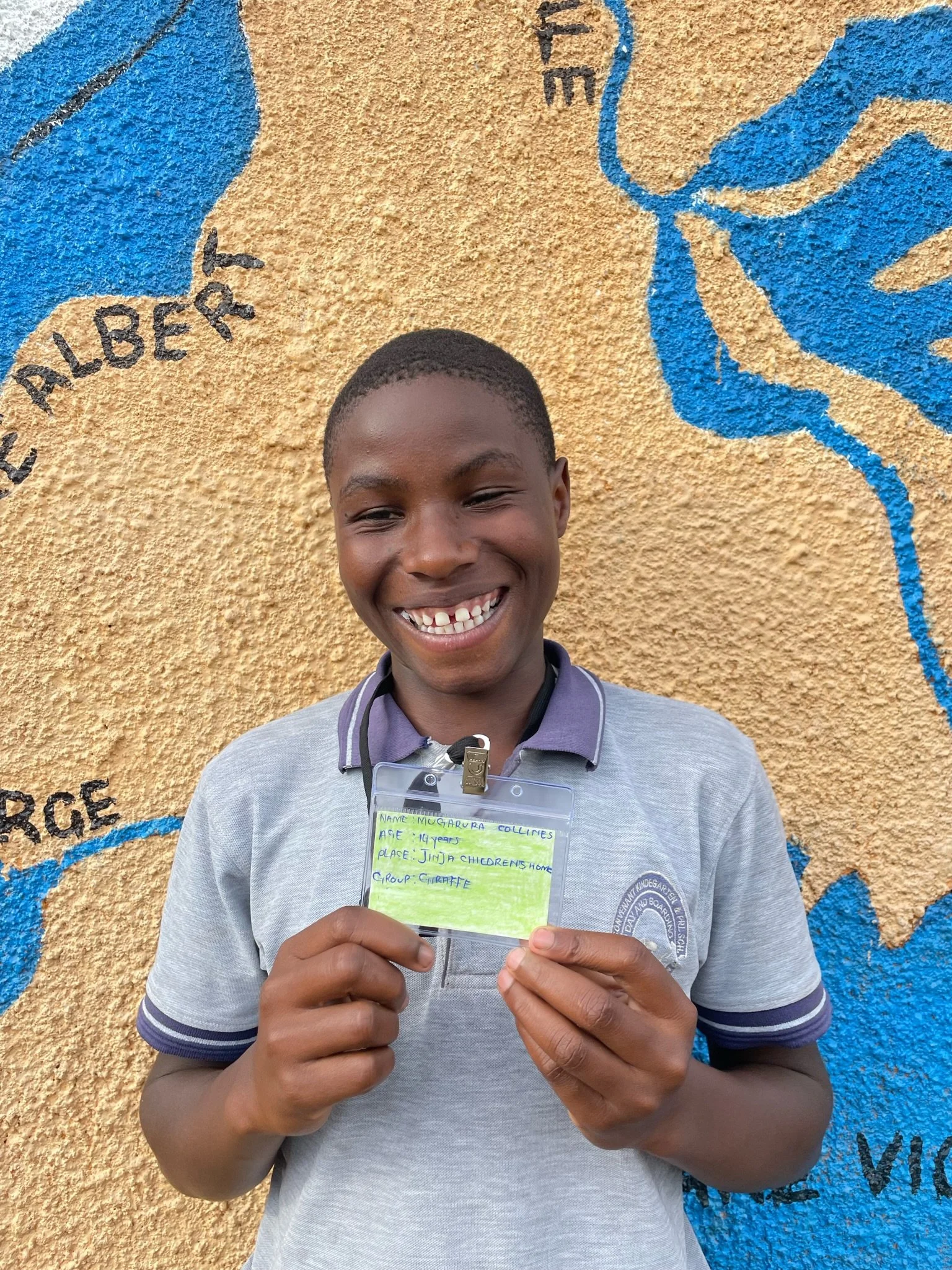 Mugarura Collines, age 14