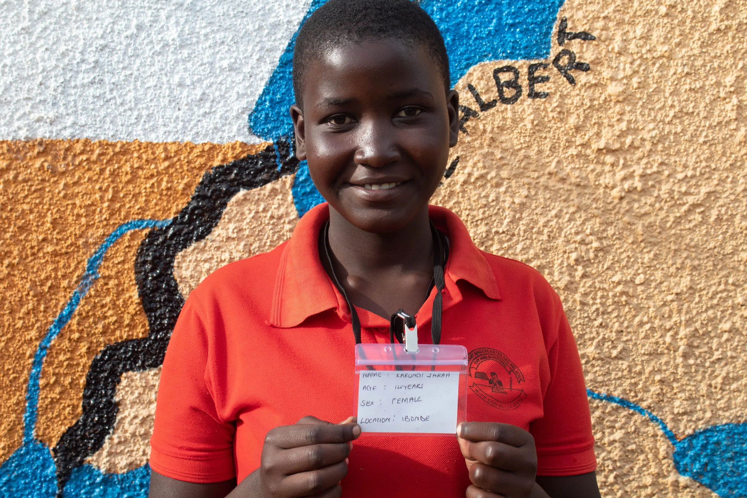 Karungi Sarah, age 14