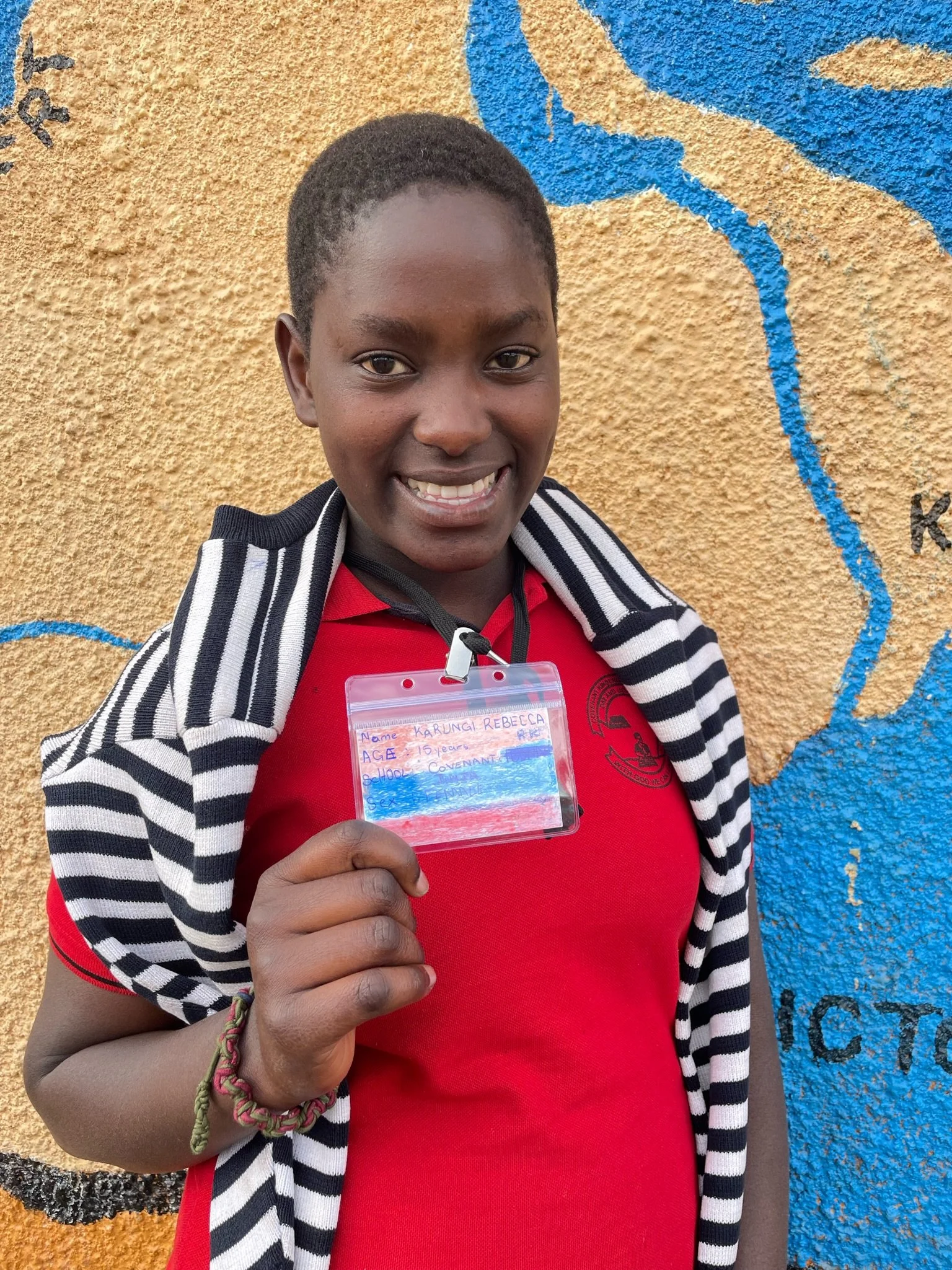 Karungi Rebecca, age 15 