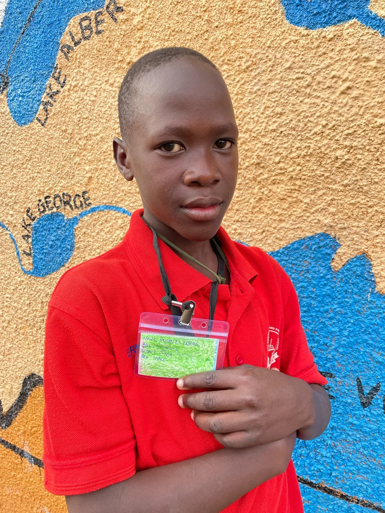 Musasizi Edrine, age 14