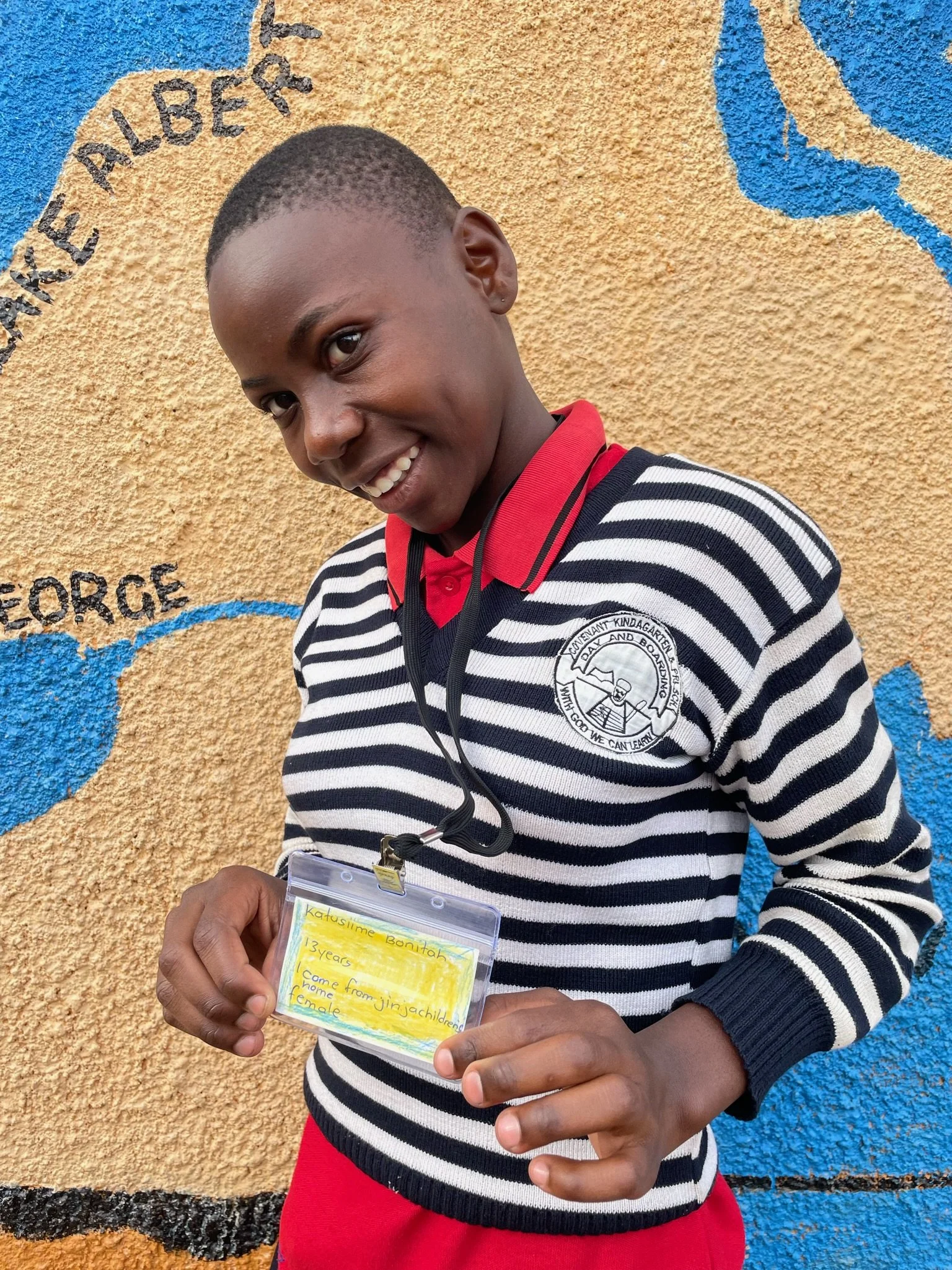 Katusiime Bonitah, age 13