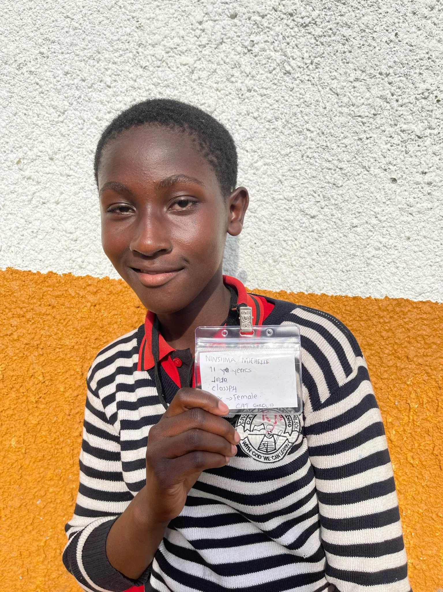 Ninsiima Michelle, age 11