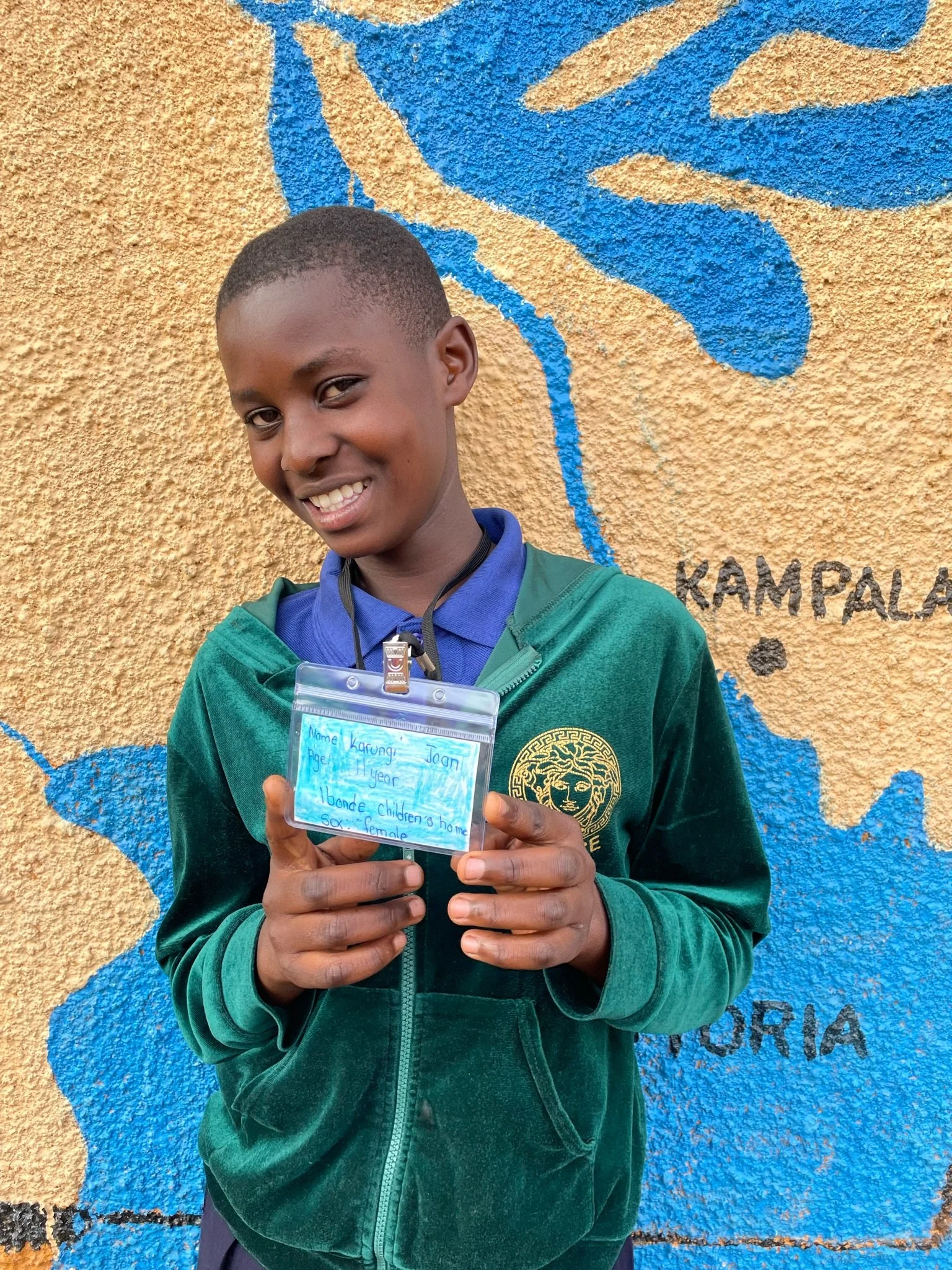 Karungi Joan, age 11