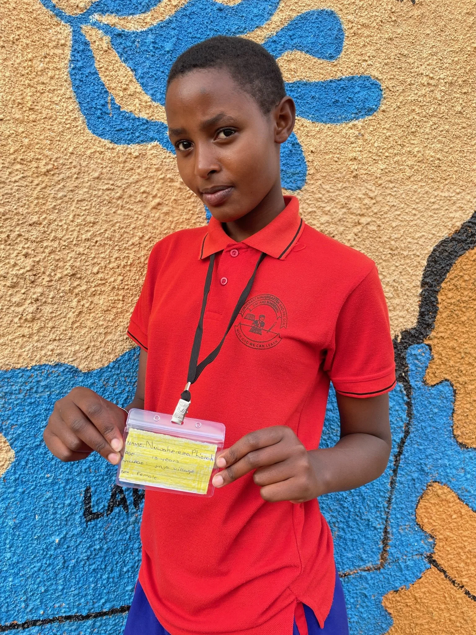 Nuwahereza Phionah, age 13