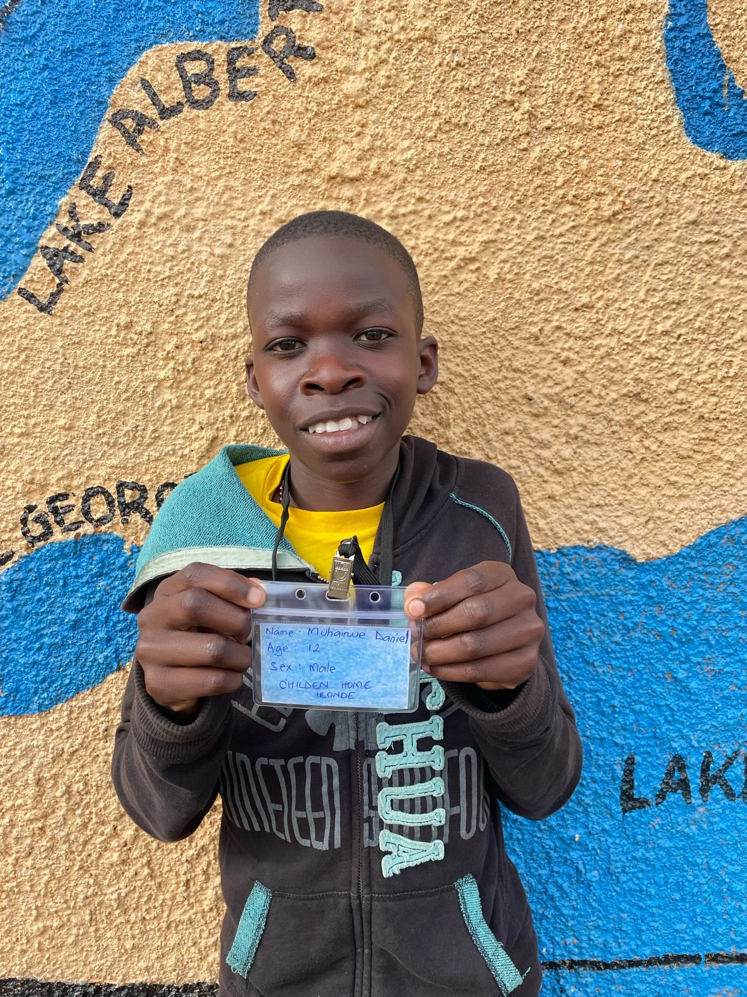 Muhairwe Daniel, age 12