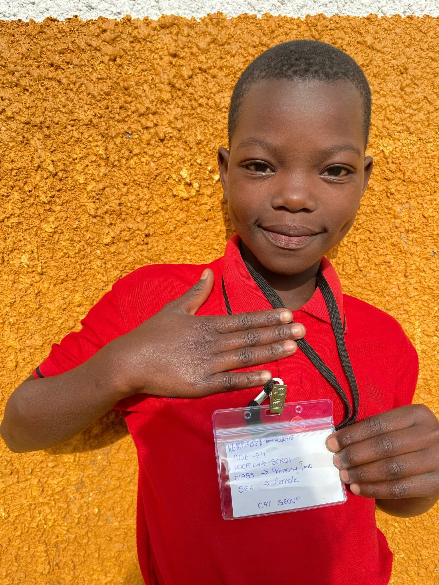 Kembabzi Immaculate, age 11