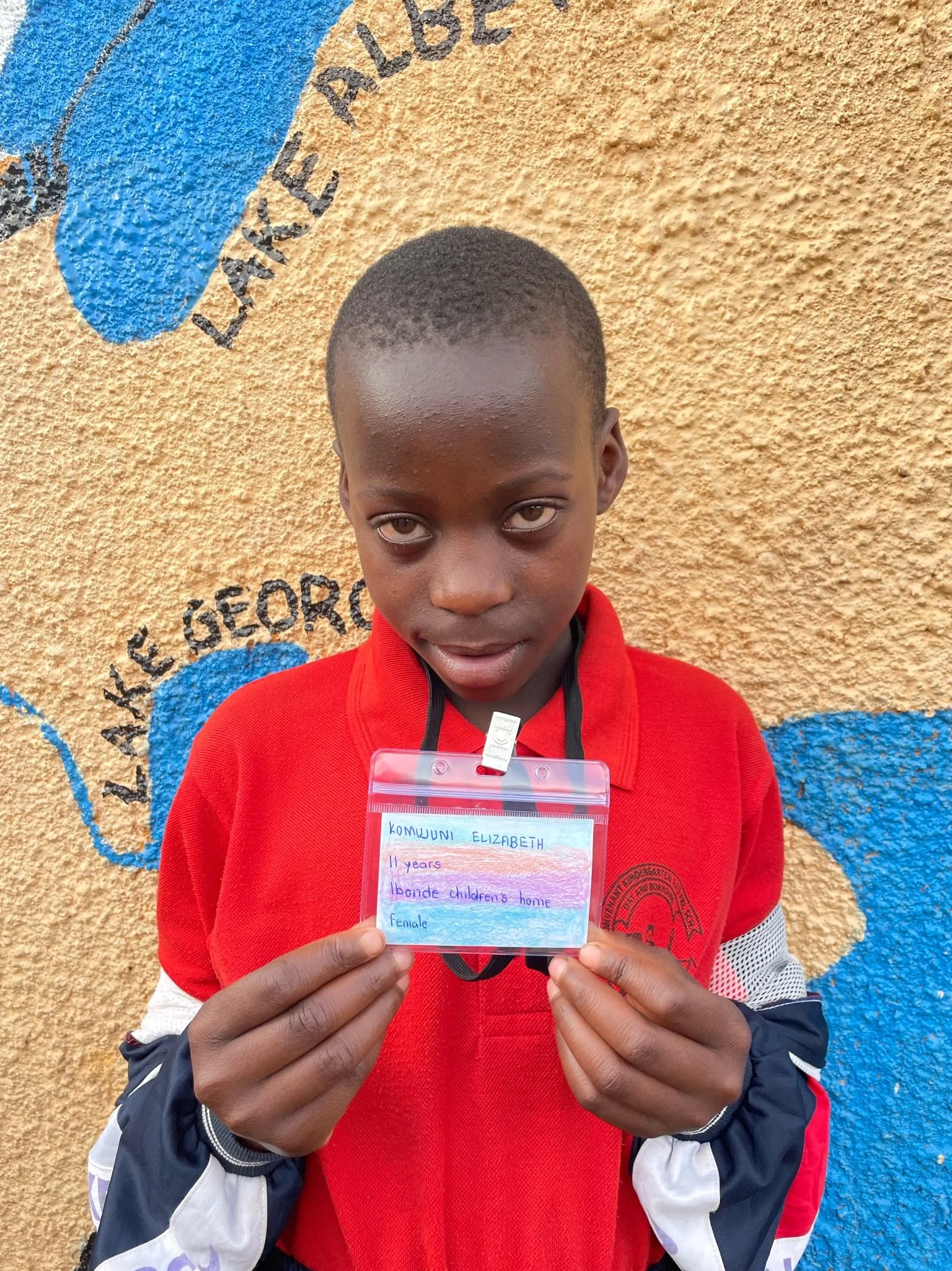 Komujuni Elizabeth, age 11