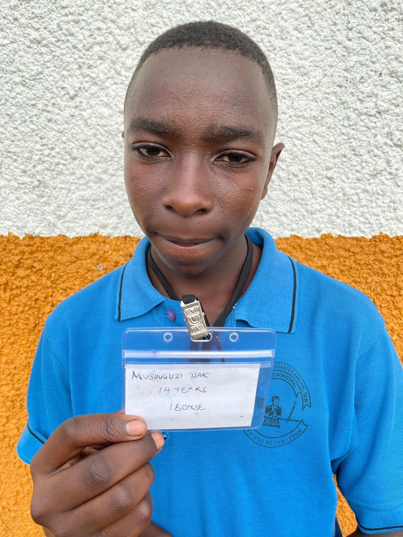 Musinguzi Isaac, age 14