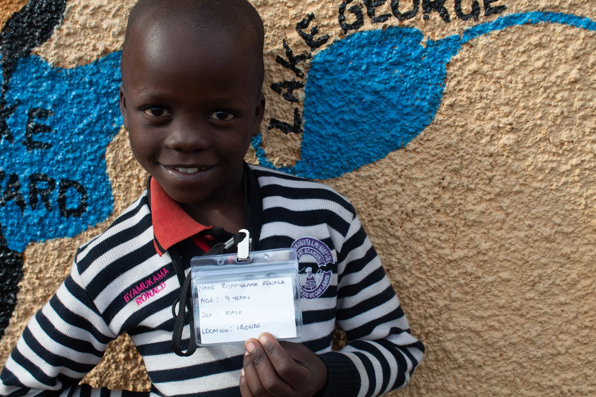 Byamukama Ronald, age 9