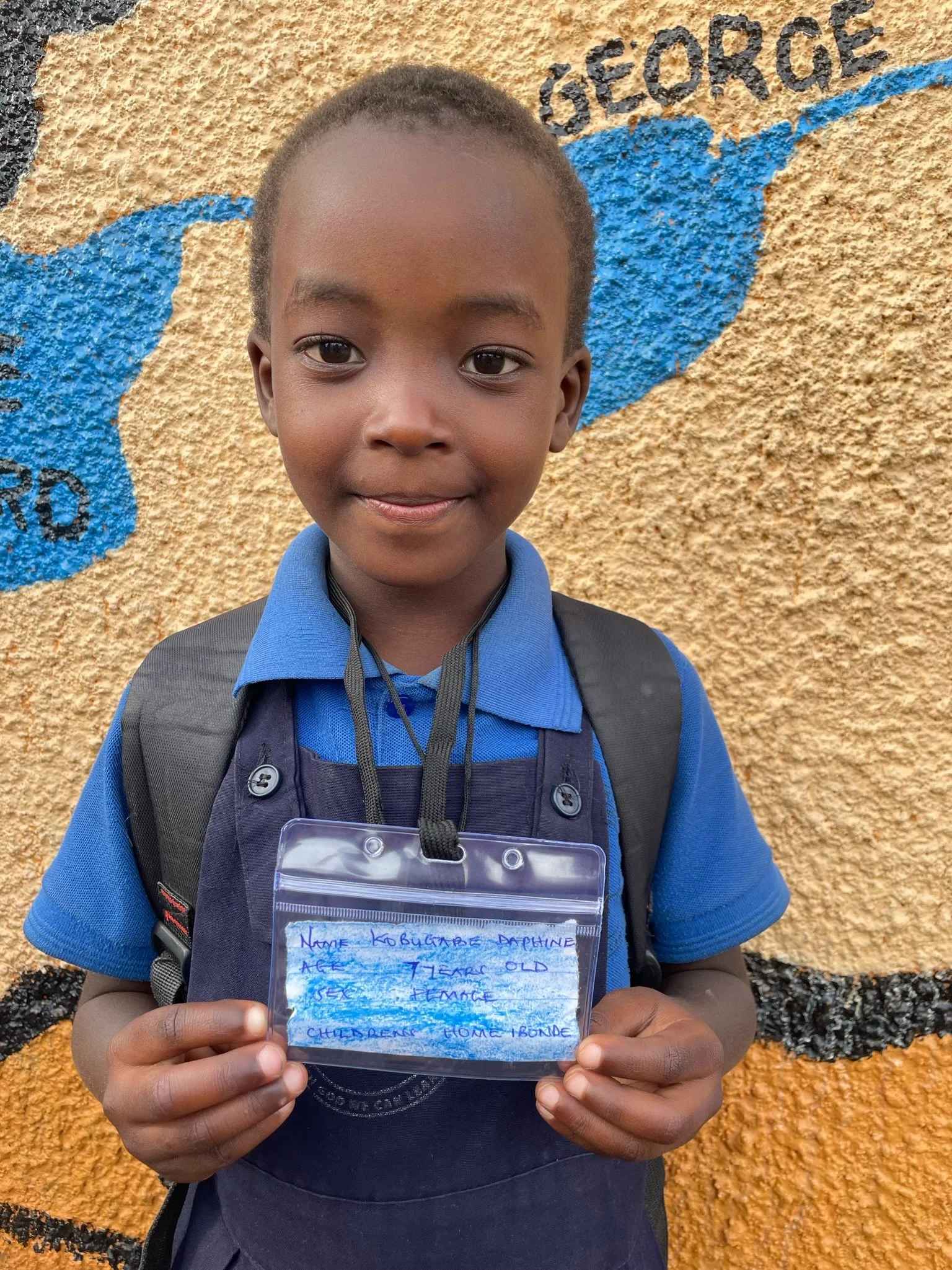 Kobugabe Daphine, age 7