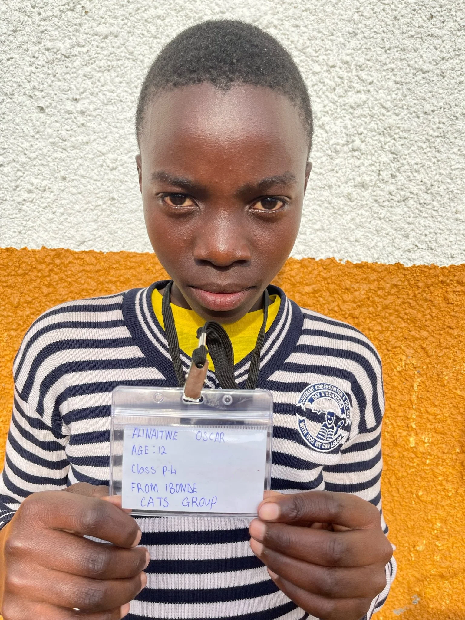 Alinaitwe Oscar, age 12