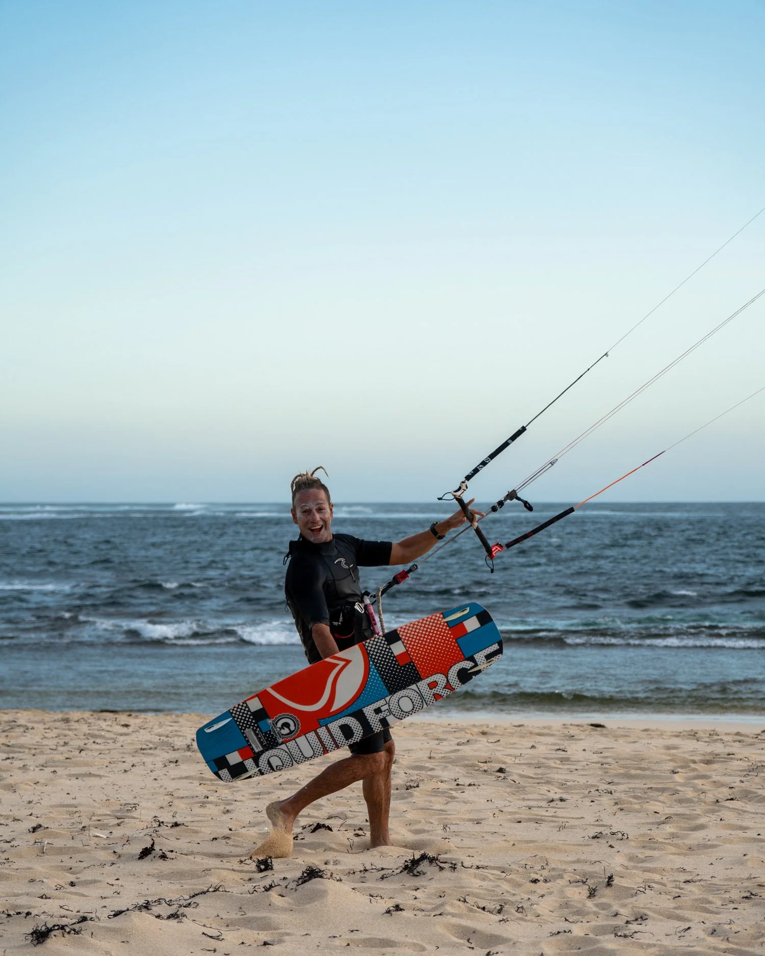windsurfer with Liquid Force surfboard