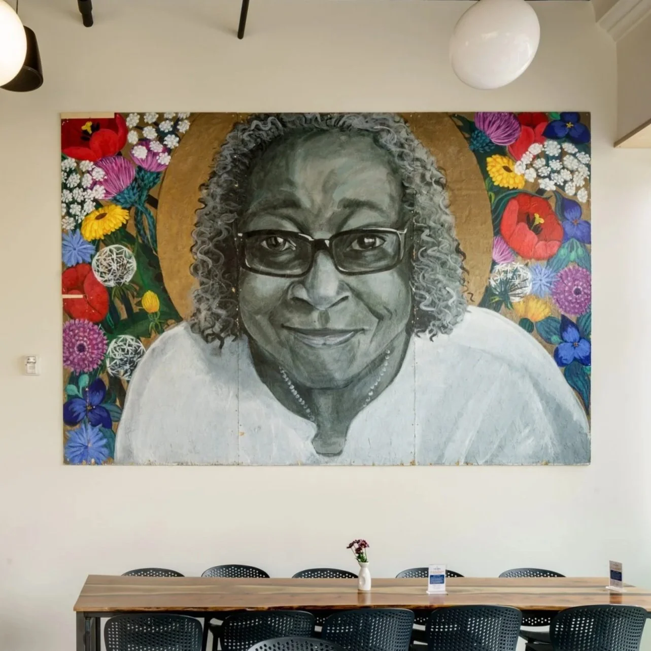 A mural of RS co-founder Thelma Altschul in Thelma's Kitchen