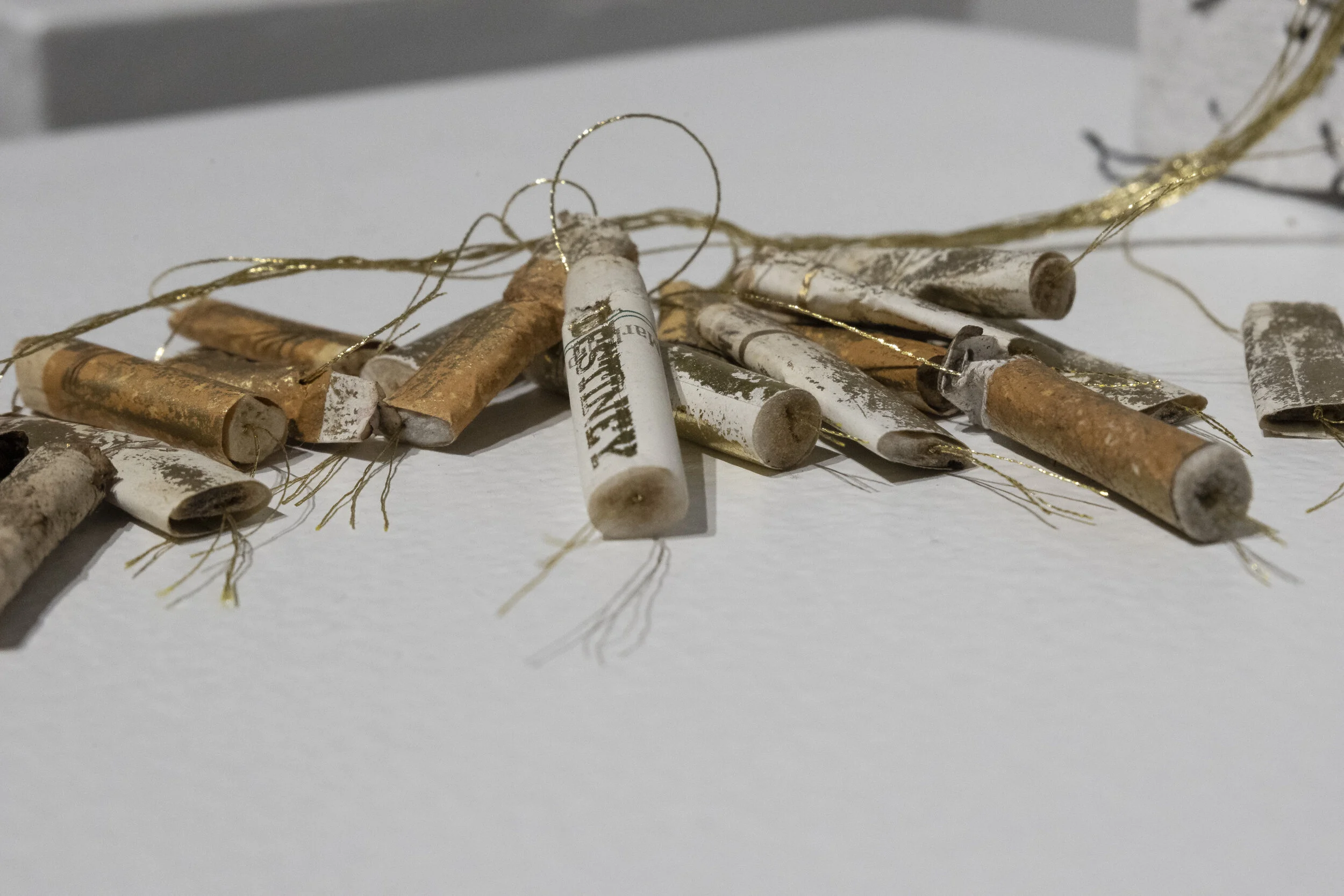 Jacob Wan Secrette (Detail) 02 Artist’s book,
handmade paper
of cigarettes,
threads, 
13" x 4" x 1" $300.00 2019