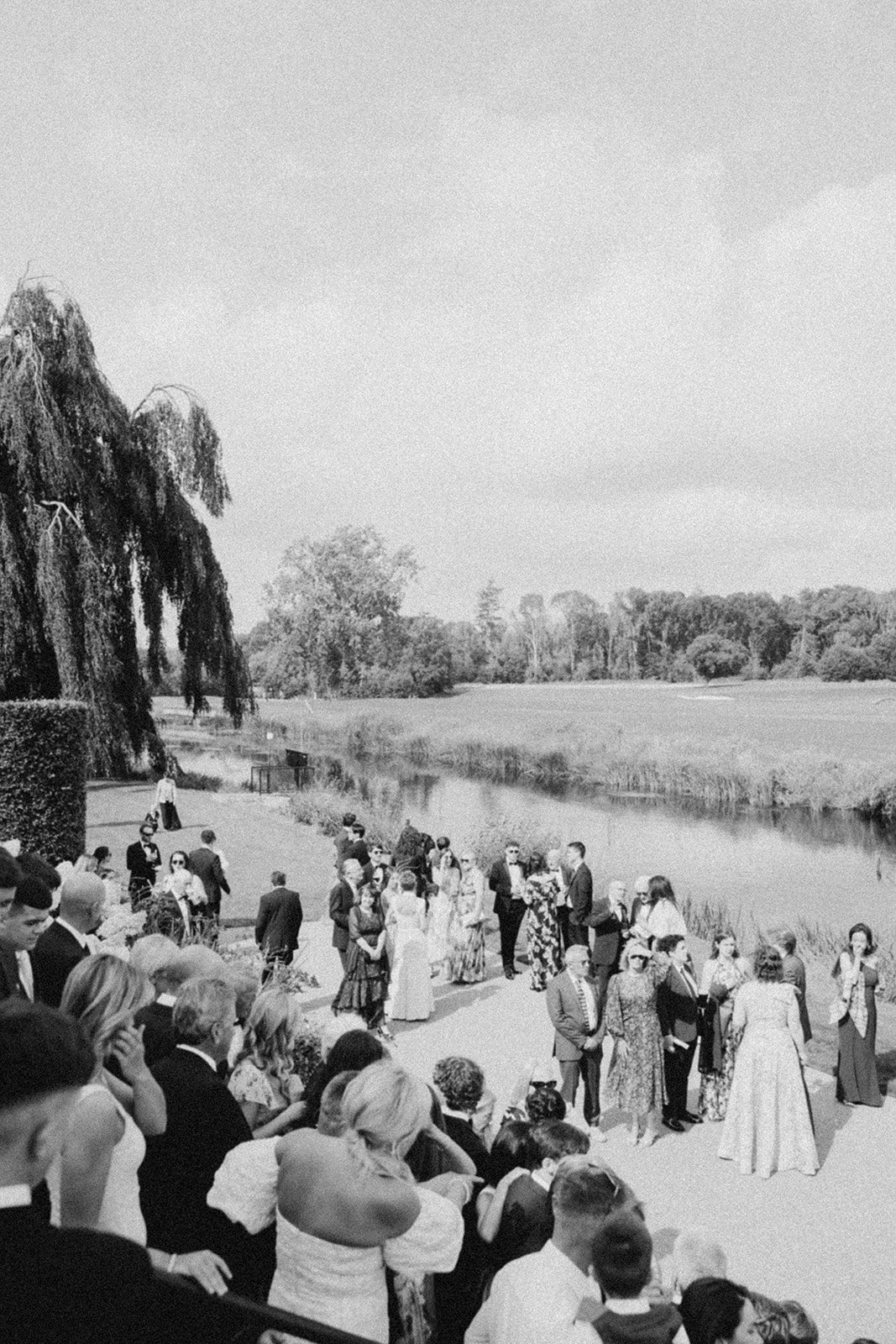 Guests at a drinks reception during a multi-day destination wedding at Adare Manor in Ireland