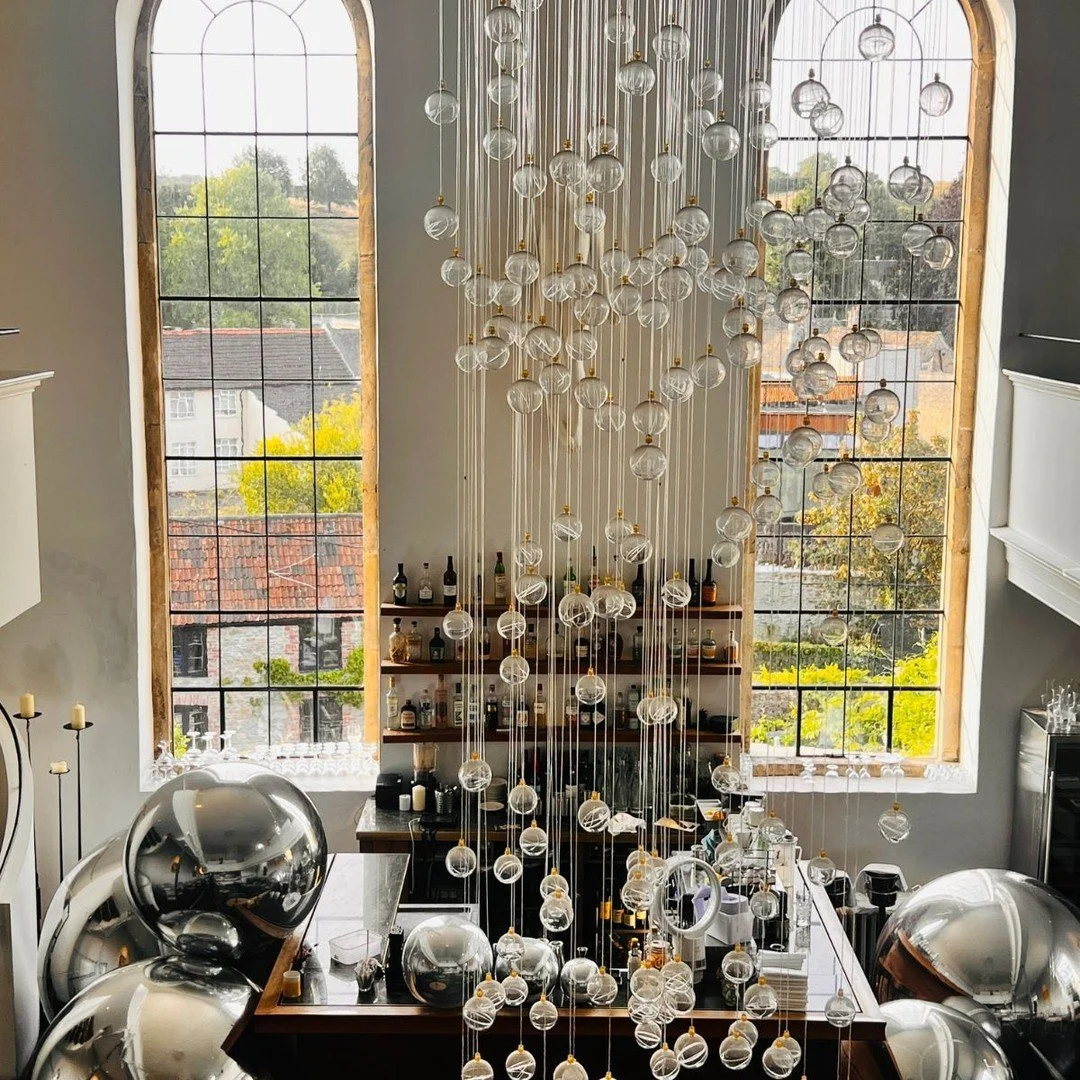 Making a statement inside this stunning Bruton  restaurant.
 🥂 These giant chrome silver inflatable sphere balls are the ultimate way to dress up an indoor venue .
Perfect for weddings, milestone birthdays, private dining parties, or corporate event