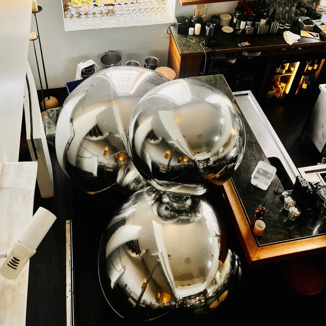 Our giant mirror sphere balls bringing the ultimate reflection and shine to this Stunning restaurant.
When it comes to high-end corporate galas and award dinners, details matter. These chrome installations create a sophisticated, luxury atmosphere th