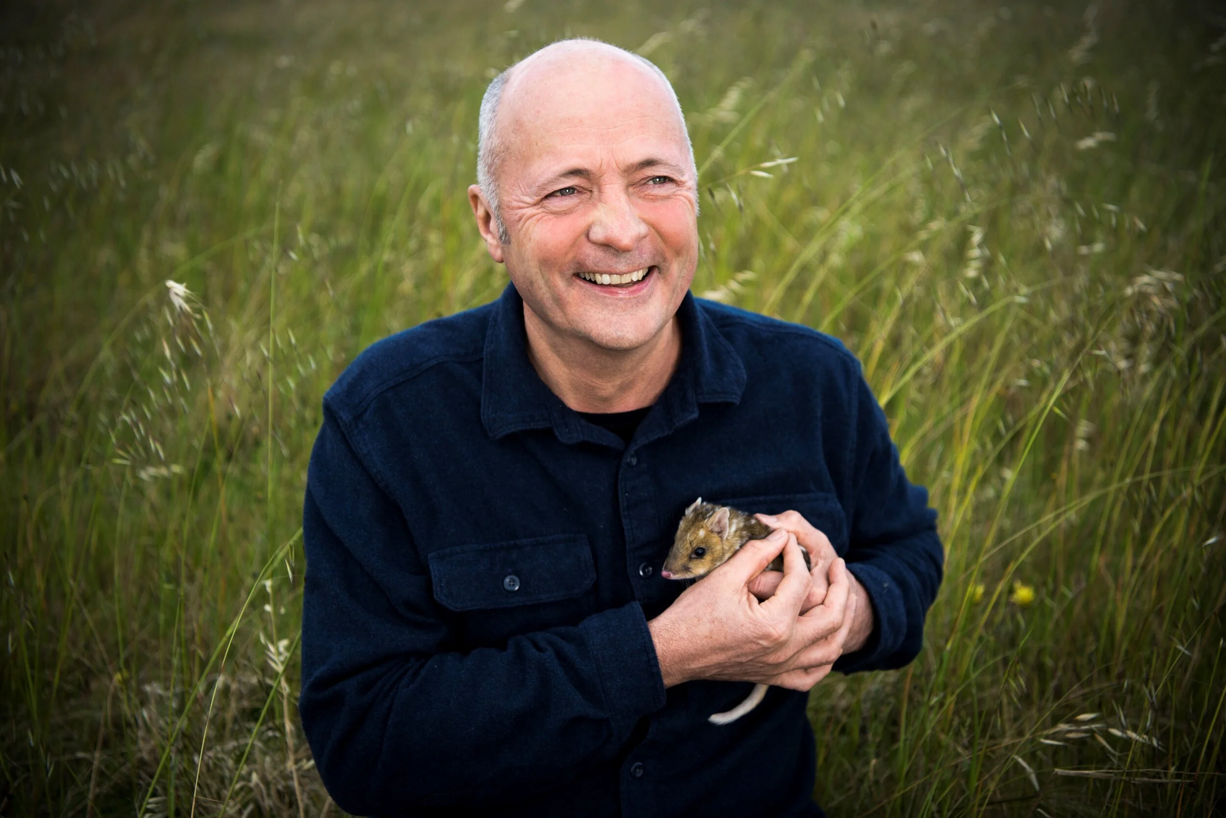 Nigel_Sharp_with_new_Eastern_Quoll_offspring.jpg