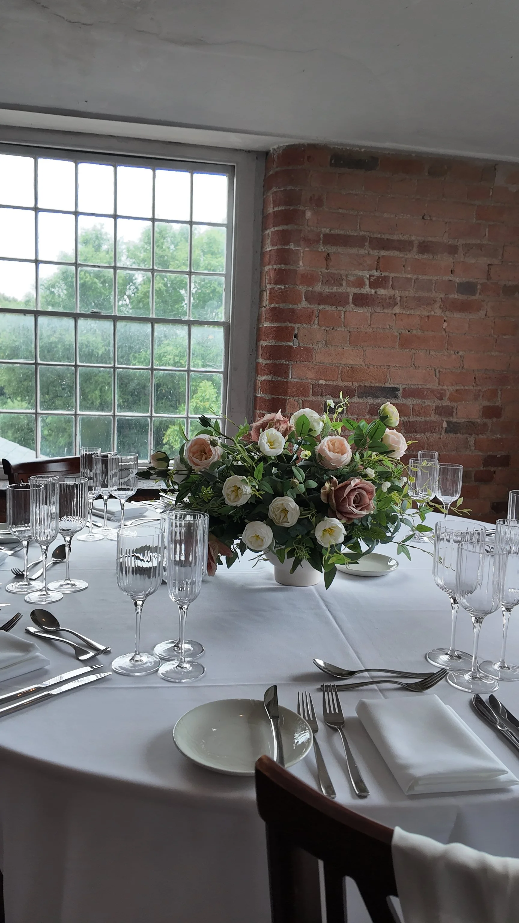 Blush pink floral bowl centrepiece for wedding table styling