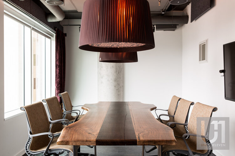 Professional commercial photography of a conference room at Shopify's Ottawa offices
