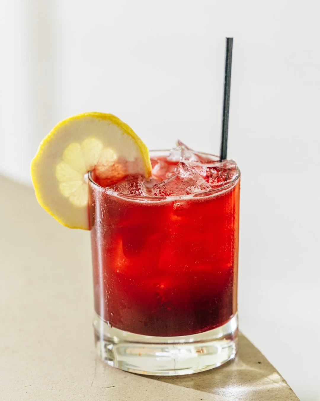 The Spittin' Image has been on our cocktail menu since the beginning. Bourbon, Vivian's blueberry bbq shrub, and a splash of lemon.
