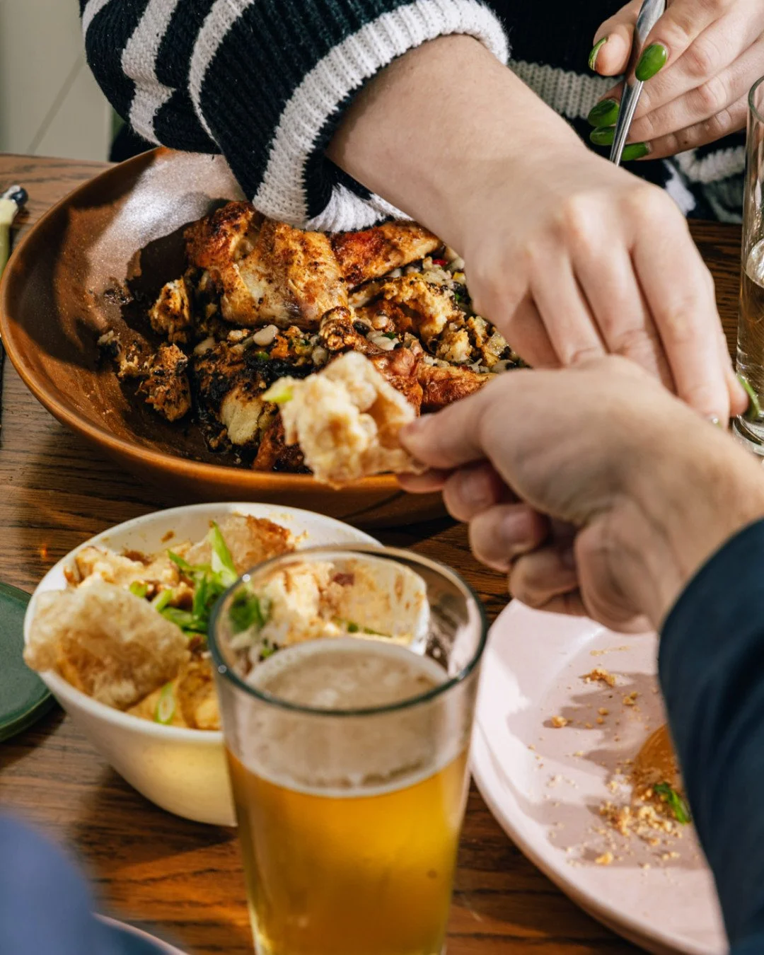 Pimento cheese grits with pork rinds for scoopin' to ease your Sunday scaries.