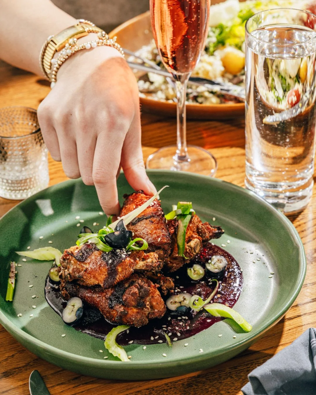 If you needed a sign to order the wings, this is it. Vivian's blueberry bbq sauce, benne, celery, and scallion come together to create a bite that hits the spot any time.