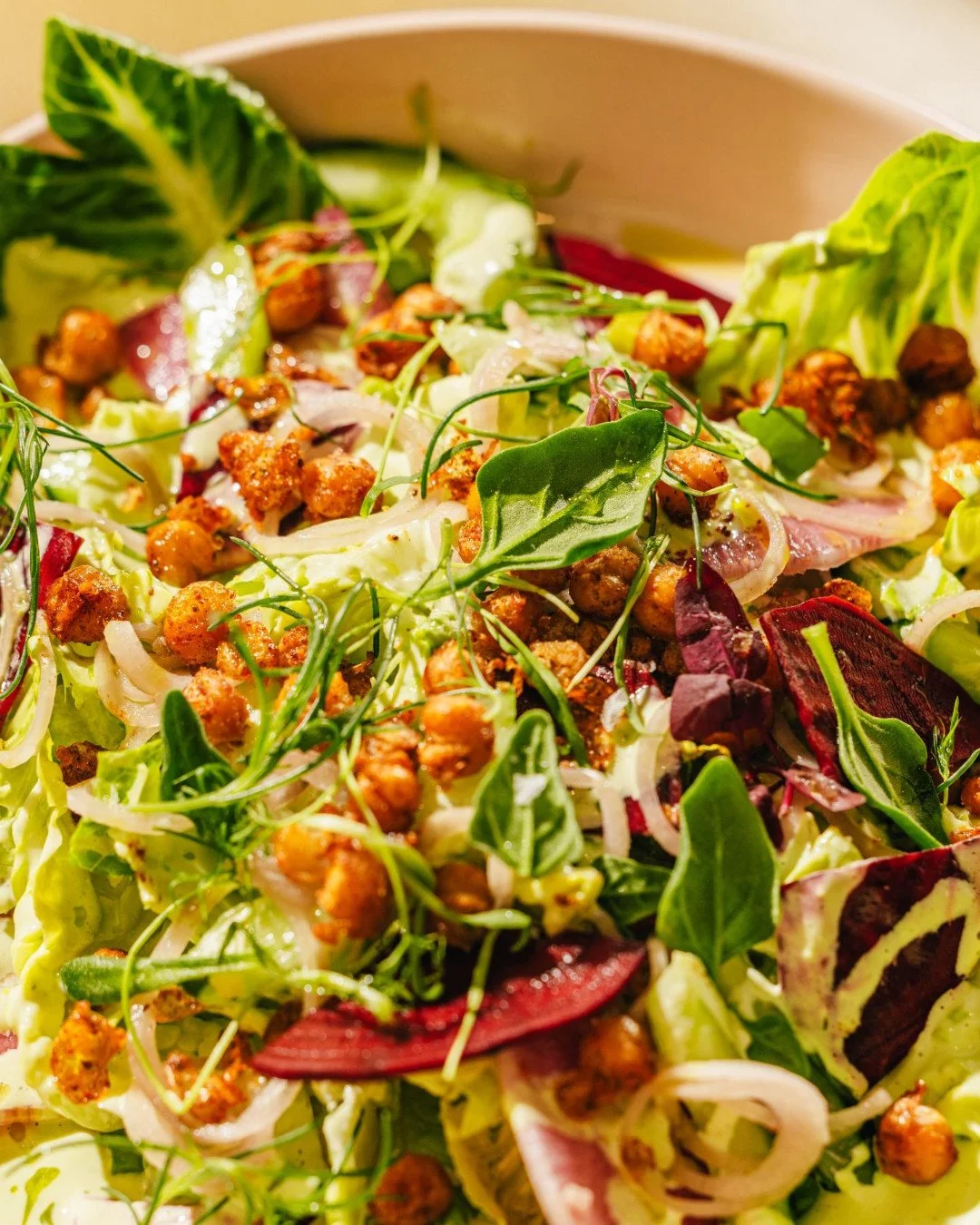 A big ol' salad is just the ticket as that Charleston humidity starts creeping back up. Not to toot our own horn, but these two might be some of our best work yet.

Little Gem: cucumber, shaved beet, pickled shallot, crispy garbanzo beans, and green 