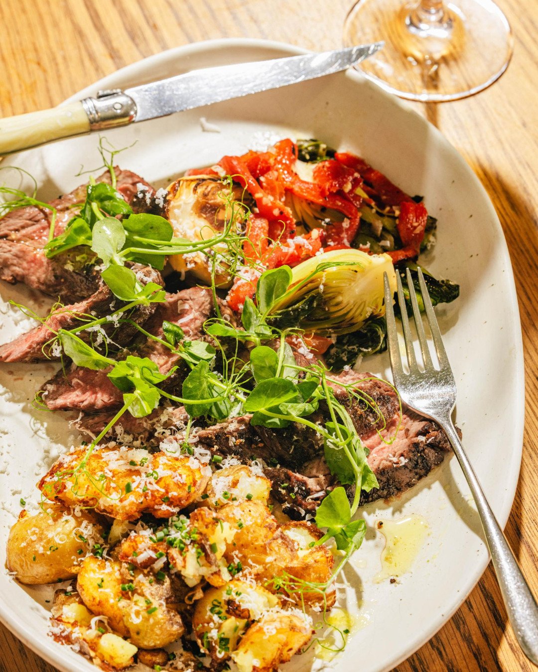 Spring brought a lot of good things with it. The Steak Lenoir is one of them. Updated for the season with roasted piquillo pepper, bok choy, smashed potatoes, and chipotle aioli.