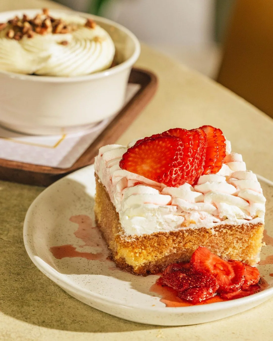 A slice of strawberry shortcake to top off a meal sounds just about perfect to us. What about you?

Vanilla cake, strawberry coulis, and whipped cream 🍓