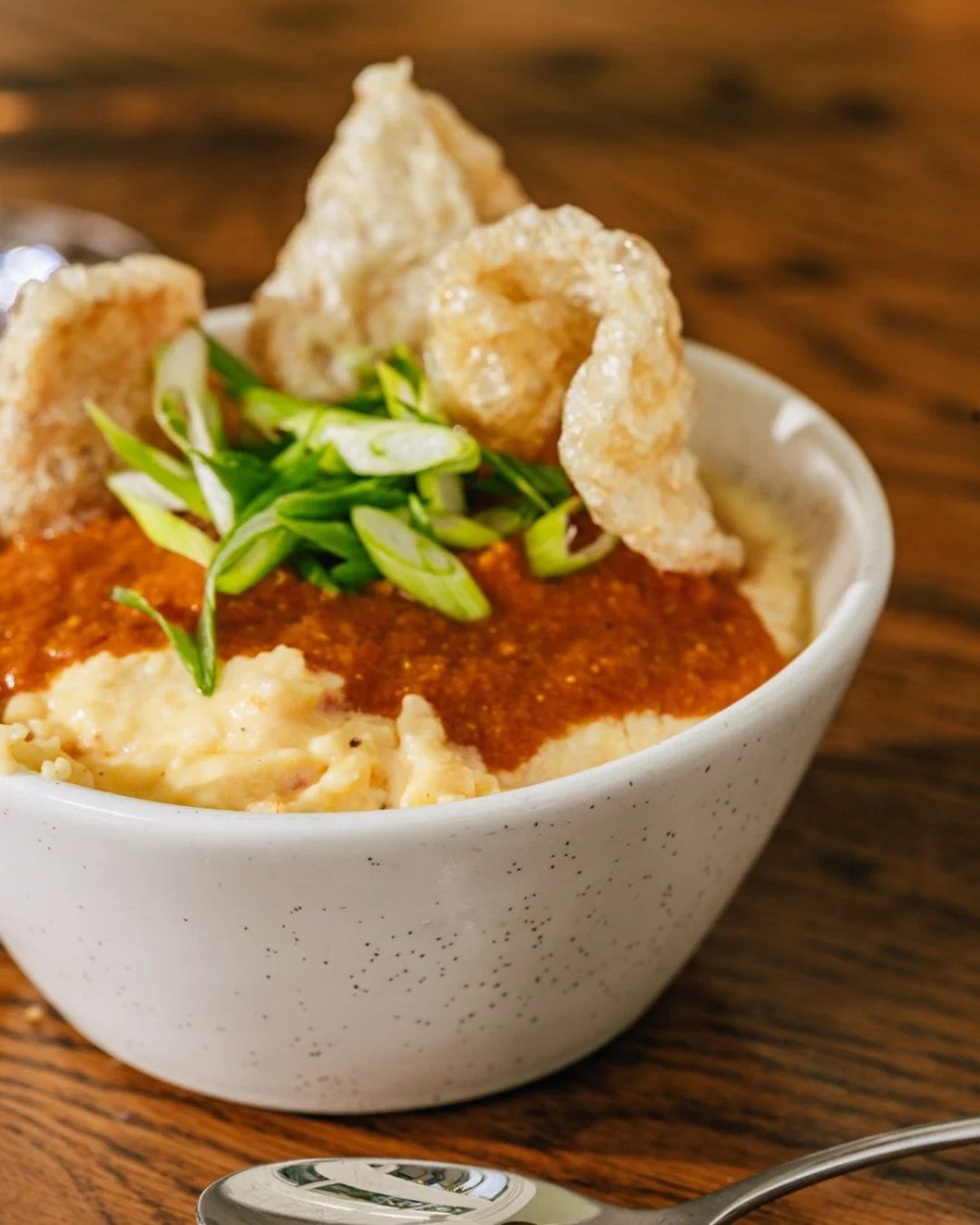 Pimento cheese grits. Crispy pork rinds. Absolutely iconic.